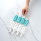 Pastry Tek 4 Cavities Popsicle Mold, 1 Cylinder Cakesicle Mold - Flexible, Freezable, White Silicone Cake Popsicle Mold, Easy Release, For Baking - Restaurantware