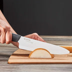 Kyocera’s Revolution 4-Piece Ceramic Knife Set: Ceramic Chef Knife For Your Cooking Needs, 7" Chef's Santoku, 5.5" Santoku, 4.5" Utility & 3" Paring Knives, Black/White