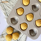 CHEFMADE Muffin Cake pan, 12-Cavity Non-Stick Chestnut-Shaped Bakeware for Oven Baking (Champagne Gold)