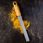 Microplane Premium Zester Grater in Mustard | Lemon Zester tool, Hard Cheese & Vegetable Grater | For Citrus, Parmesan Cheese, Garlic, Ginger, Nutmeg | Fine Stainless Steel Blade, Made in USA